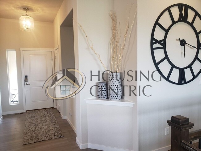 Building Photo - HUGE FORMER MODEL HOME WITH 4-CAR GARAGE!