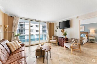 Building Photo - 6917 Collins Ave