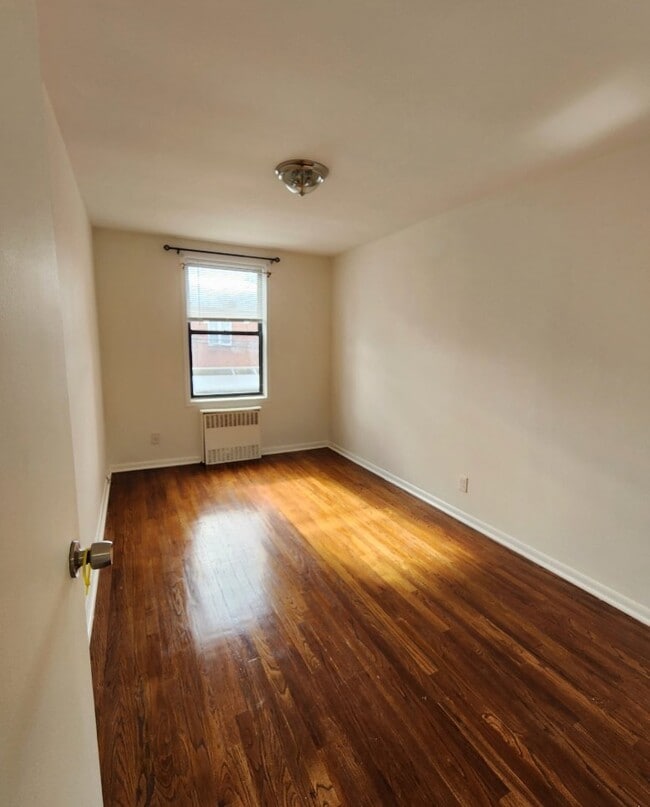 Building Photo - 1366 East 100th Street