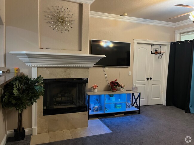 Fireplace in living room - 7400 W Flamingo Rd