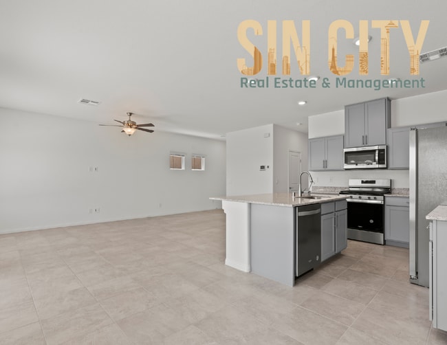 Building Photo - "Charming 4-Bed Home on Love Springs Ln: Spacious 1865 Sq Ft with 2.5 Baths in North Las Vegas!"