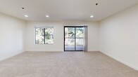 This 690 square foot apartment in Fairfield, CA offers a thoughtful layout maximizing space efficiency. The open-concept design seamlessly integrates the living room and kitchen, creating a spacious feel. The kitchen boasts modern dark wood cabinetry, stainless steel appliances, and sleek white countertops, perfect for culinary enthusiasts.

The 180 square foot bedroom provides ample space and features a large built-in closet with sliding doors, ensuring optimal storage. The bathroom showcases a contemporary design with a wooden vanity and a shower-tub combination.

Natural light floods the apartment through large windows, while a private balcony offers outdoor space and scenic views. The unit is finished with a mix of warm hardwood flooring in the kitchen and bathroom, and plush carpeting in the living area and bedroom for comfort.

Recessed lighting throughout adds a modern touch, while the neutral color palette allows for personalization. This well-designed apartment combines functionality and style, making it an ideal home for singles or couples seeking a convenient urban lifestyle in Fairfield.
