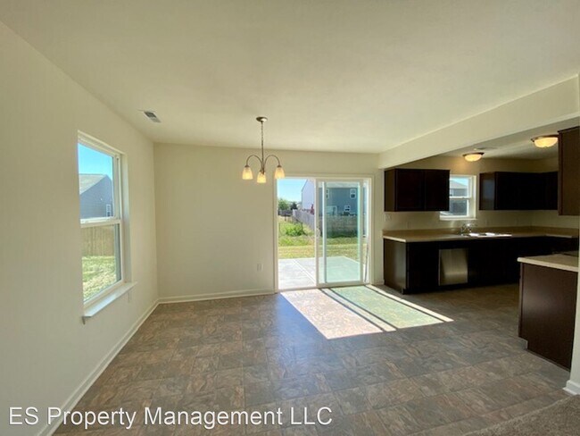 Building Photo - 4 br, 2.5 bath House - 6410 Avacado Dr.
