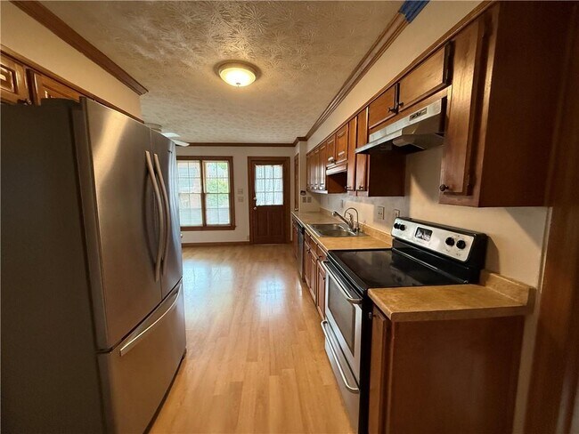 Foto del edificio - 3209 Henderson Walk