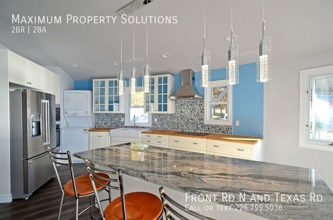 Building Photo - ALL INCLUSIVE! Stunning Waterfront Home