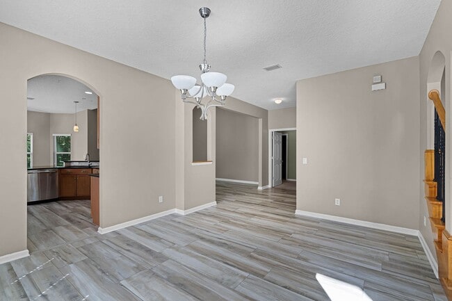 Building Photo - 4/2.5/2 Woodland Lakes Preserve Available Now