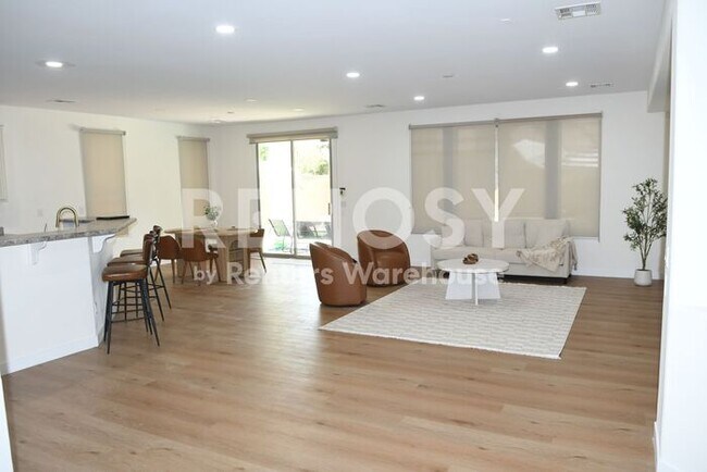 Building Photo - 3 Bedroom + Den Home with Pool & Putting Green – Pool Service Included!