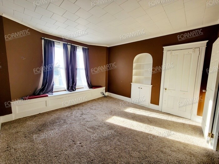 Building Photo - Pet-Friendly Apartment With A Bonus Room!