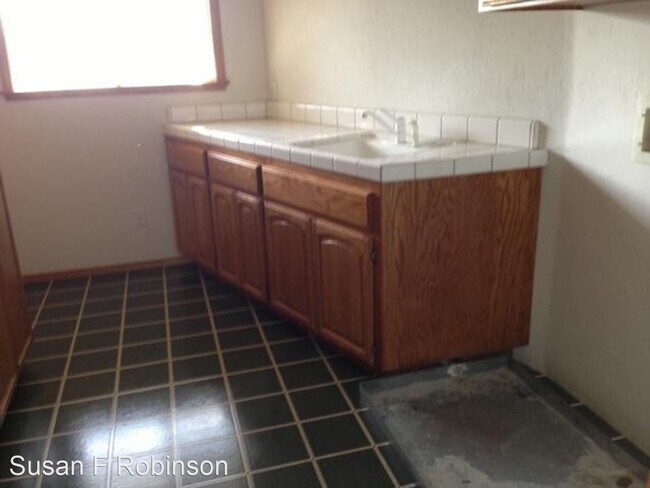 Foto del edificio - 4 br, 3 bath House - 7008 Langley Cyn Road