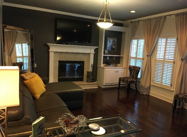 Family Room (wood burning fireplace) - 347 Covered Bridge Pl SW