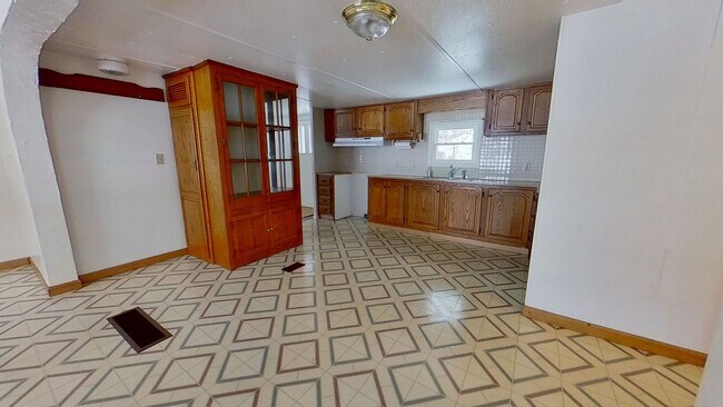 Foto del edificio - First-Floor Living with Private Wooded Backyard Setting