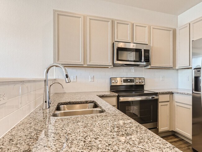 Building Photo - Newer 3BR Denver Townhome | 2-Car Garage | Modern Finishes