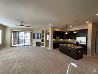 Kitchen to the Living area & Dining area - 15550 S 5th Ave