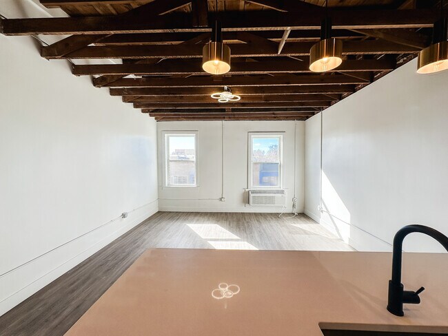 Building Photo - 9517 E Colfax Ave