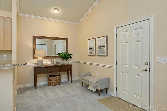 Foto del edificio - Beautiful 1-Bedroom Condo with Detached Garage in Eastwood Village Complex (Water Included)