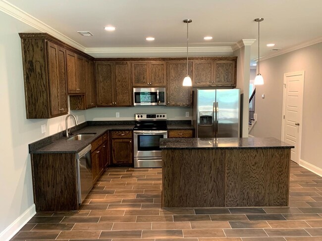 Photo - Convenient 3BR/2BA Townhome with Garage & Lawn Care Included