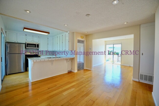 Building Photo - Serene Living on the Water’s Edge – Bright...
