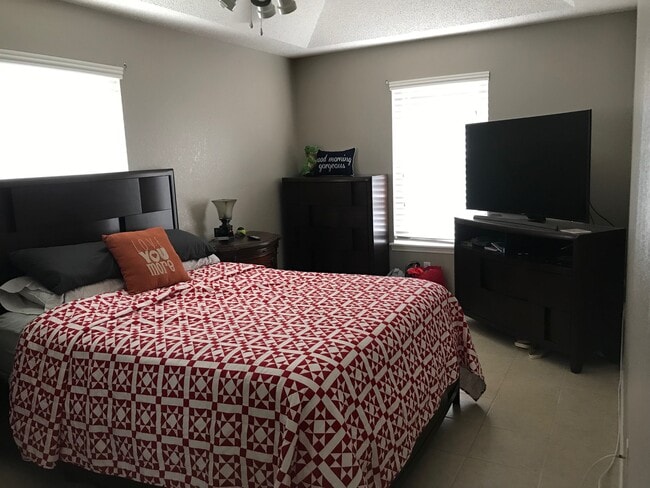 Two large bedrooms with ceiling fans and recessed ceilings. - 1801 Lexington Circle