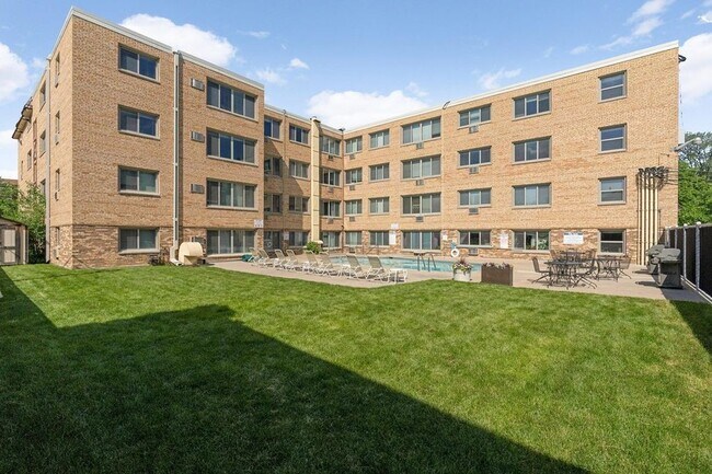 Back Yard with picnic tables and grills - 2727 W 43rd St