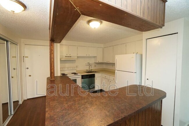 Foto del edificio - 8828 E Florida Ave