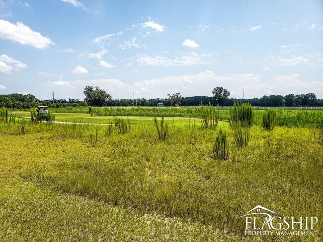 Foto del edificio - Cute Golf Course Duplex