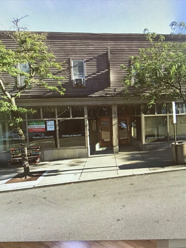 Street view, the unit is above the gelato shop. - 12409 Mayfield Rd