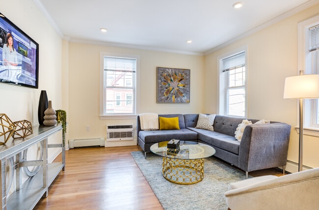 Auburn Harris Courtyard - Living Room - CHR Coolidge Corner Communities