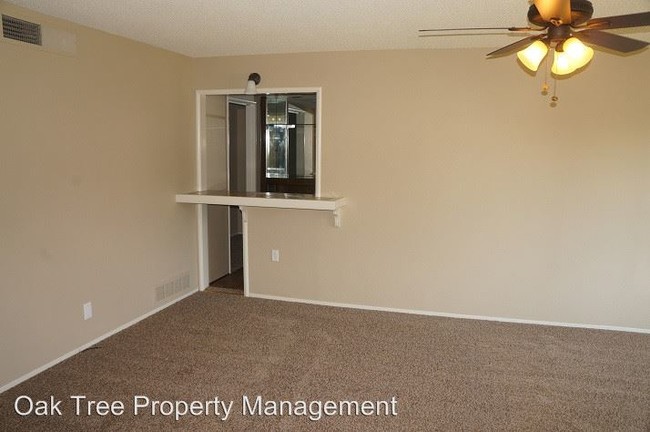 Building Photo - 4 br, 2 bath House - 715 E. Alluvial Ave