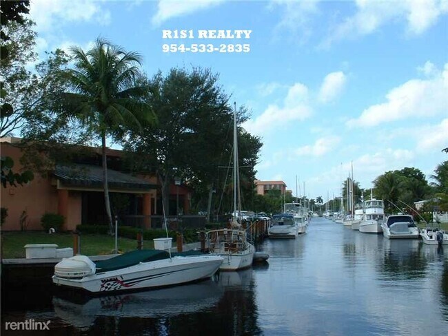 Building Photo - 2 br, 1.5 bath Condo - 1101 River Reach Dr XX