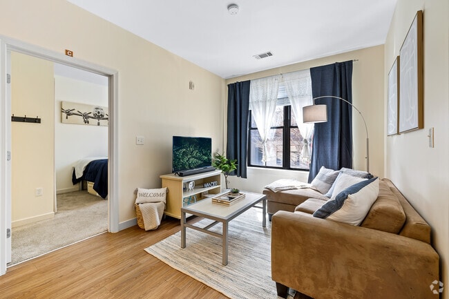 Living Room - 3BR, 3BA - 922SF - 257 Thayer Apartments