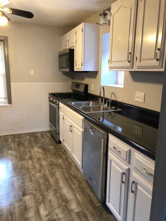 Building Photo - Beautiful  Renovated Home with Finished Ba...