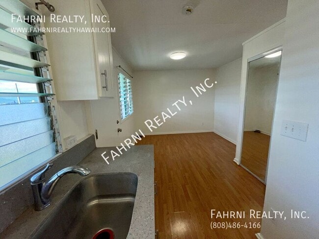 Building Photo - 1009-10A3 Maluna St