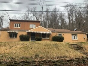 Building Photo - 6037 Poketa Rd