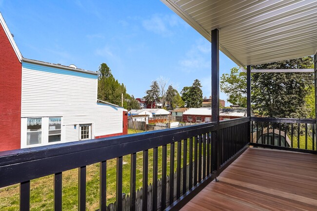 Building Photo - Bright & Fully Renovated 3BR Home with Backyard, Bonus Attic Space & Modern Upgrades