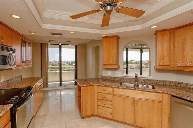 Building Photo - 5940 Pelican Bay Plaza S