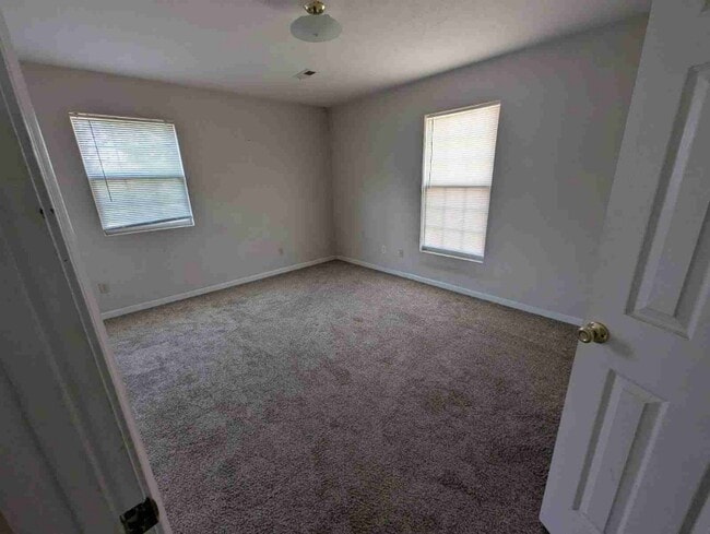 Building Photo - 5788 Metropolis Lake Rd