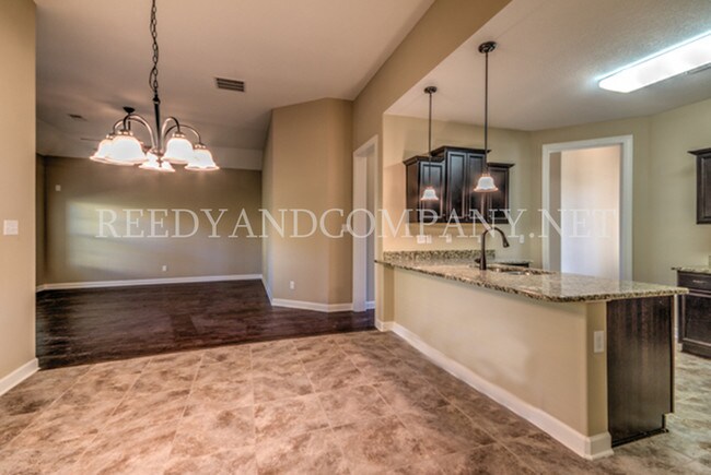 Building Photo - 4684 Ravencrest Cv N