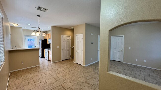 Building Photo - Gated 3 BDRM Master BDRM downstairs