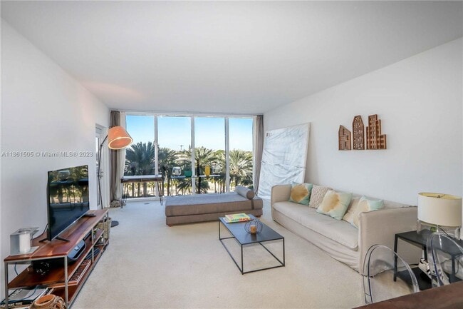 Building Photo - 10275 Collins Ave
