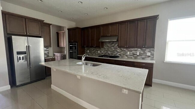 Building Photo - 10349 Royal Cypress Way