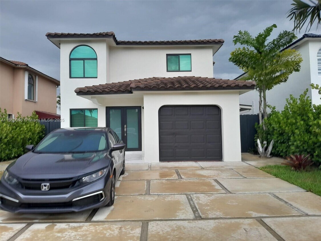Foto principal - 12887 NW 101st Pl
