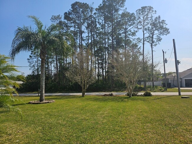 Building Photo - Lovely 3 Bedroom 2 Bath in desirable area of Palm Coast! AVAILABLE 01-16-2025