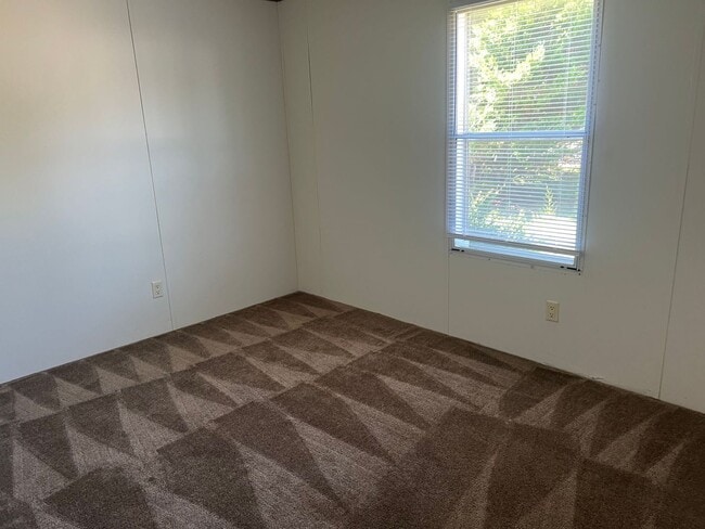 Building Photo - New Carpet & Vinyl Flooring - Pinetops Sin...