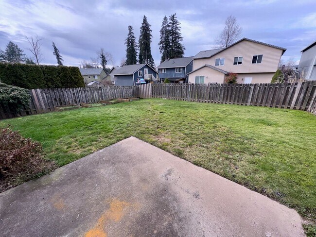 Building Photo - Spacious 4BR Home with Fenced Yard, 2-Car Garage & Convenient Location