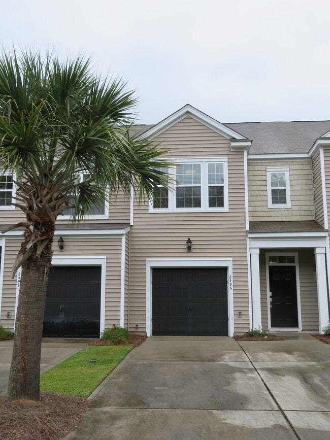 Street view of townhouse. Right inner unit in a four home building - 2496 Stadium Dr