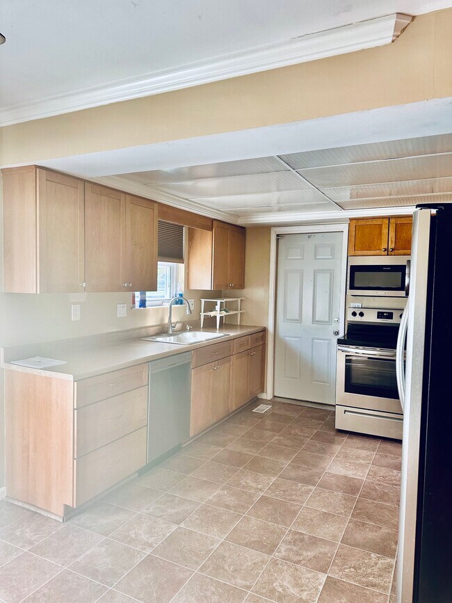 Foto del edificio - 5876 Coachmont Dr