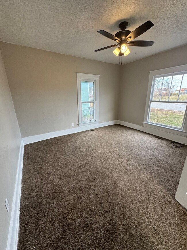 Building Photo - 4 bedroom/1 bath house w/storage building