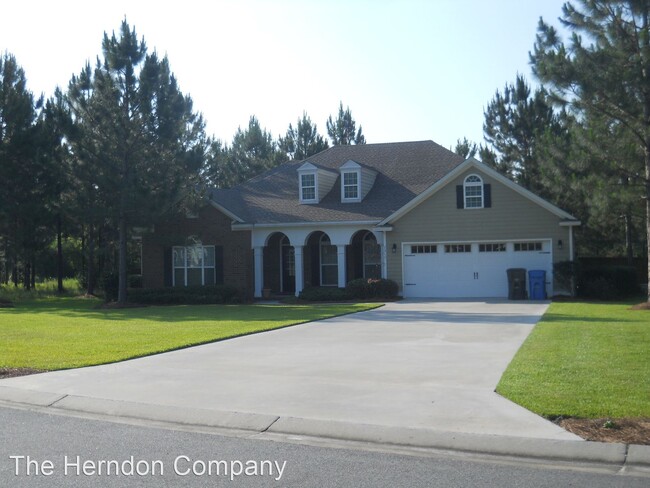 Building Photo - 4 br, 3 bath House - 7315 Wind Chase Drive