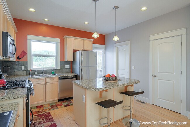 Building Photo - Duplex-style Condo with Great views of Wes...