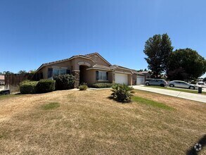 Building Photo - 9510 Manihiki Ave